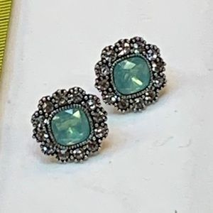 Four pairs earrings and one necklace